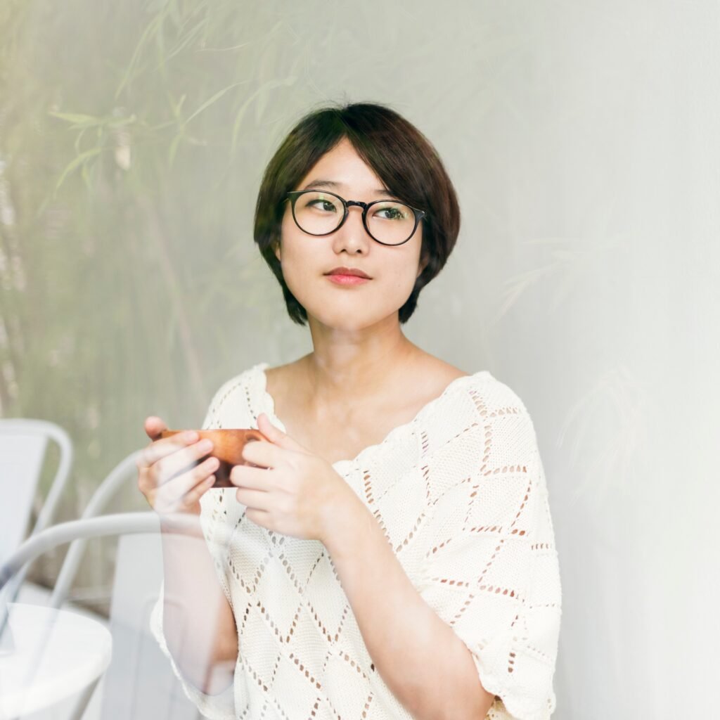 Asian Woman Drinking Tea Relax Concept