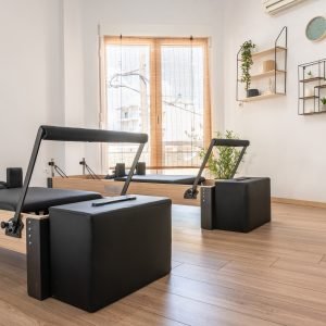 Pilates studio room with reformer beds